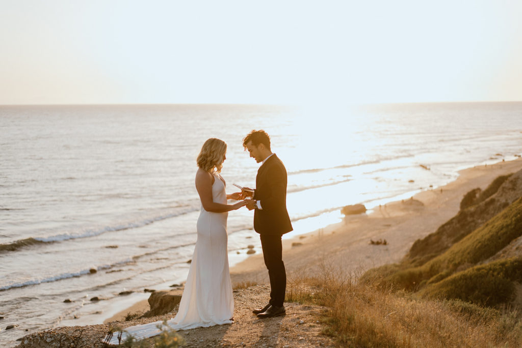 Couple exchanges vows at california coast adventurous elopement