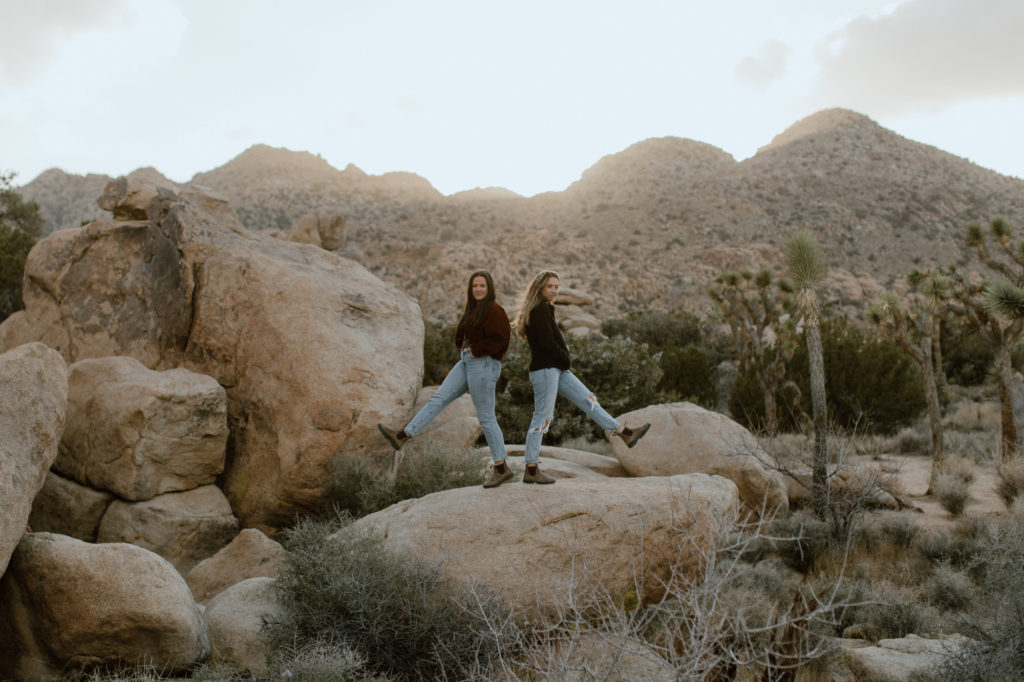 Elopement photographers stand back to back at Tucson, Arizona content day
