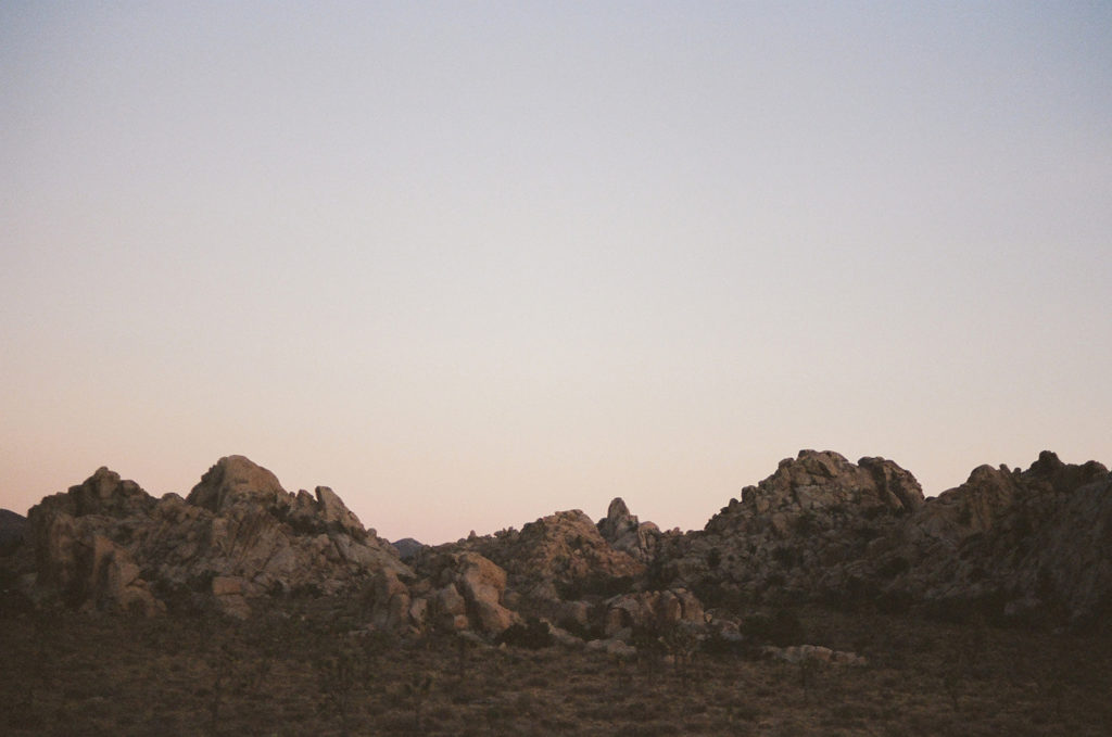 Desert rocks at sunset photo taken by photographer as she compares film photography vs digital