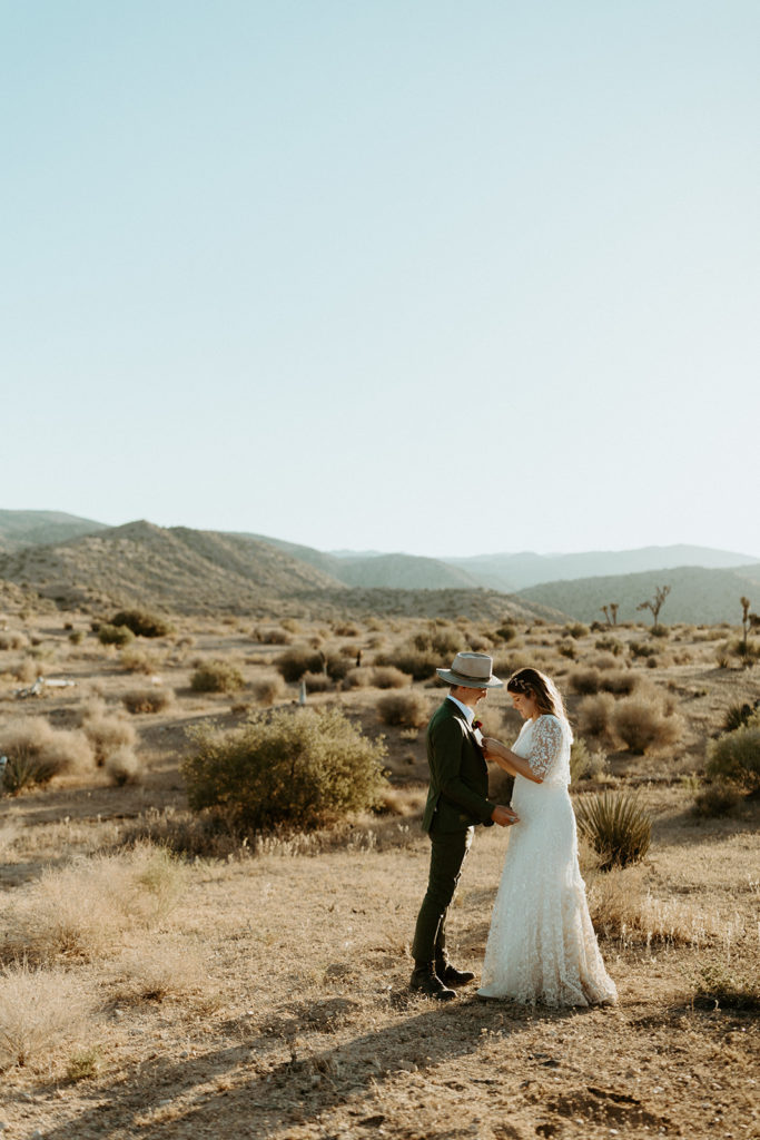 Couple exchanges vows in desert at Joshua Tree elopement