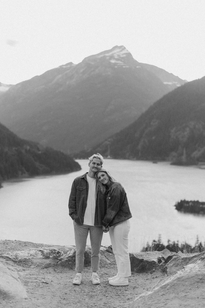 couple embraces at mountain engagement session