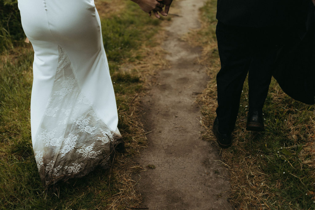bride trashes the dress at Oregon coast adventure elopement