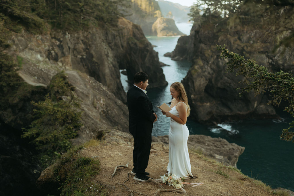 couple exchanges vows at Oregon Coast elopement wedding photoshoot