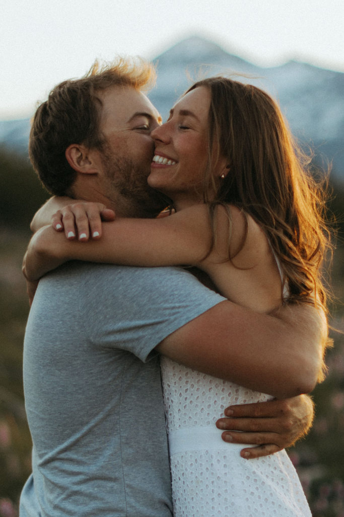 couple embraces at Bend, Oregon engagement shoot