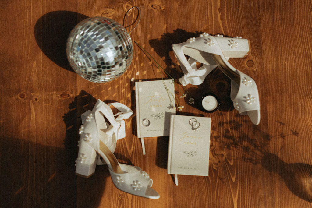 pearl shoes and other wedding details flat lay