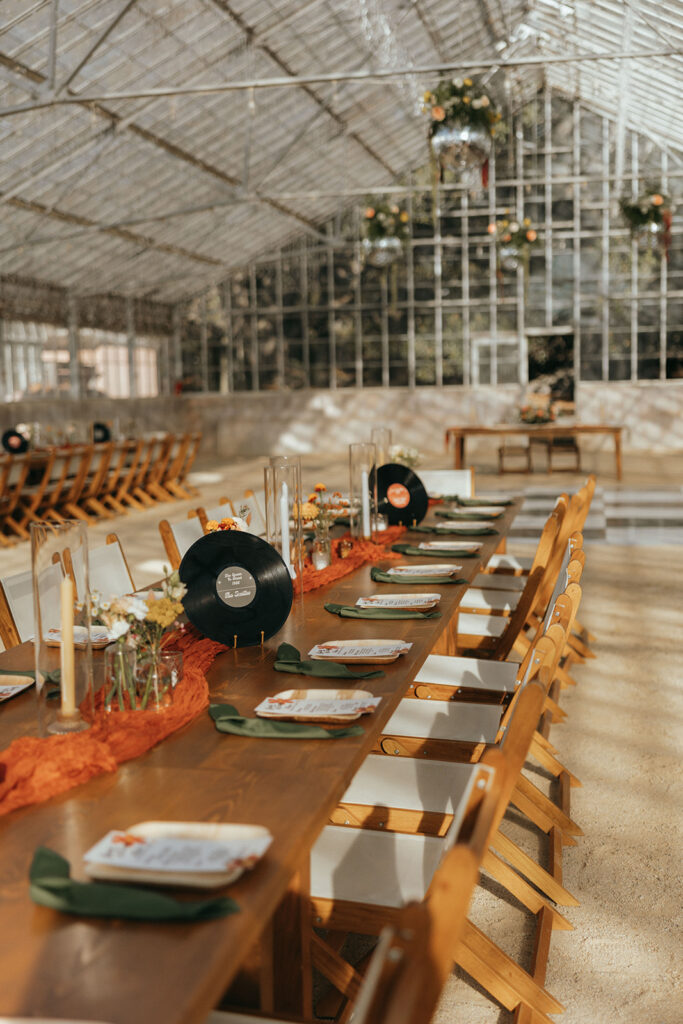 vinyl records as table settings at California greenhouse wedding