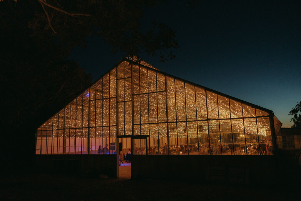 twinkle lights at greenhouse wedding reception venue