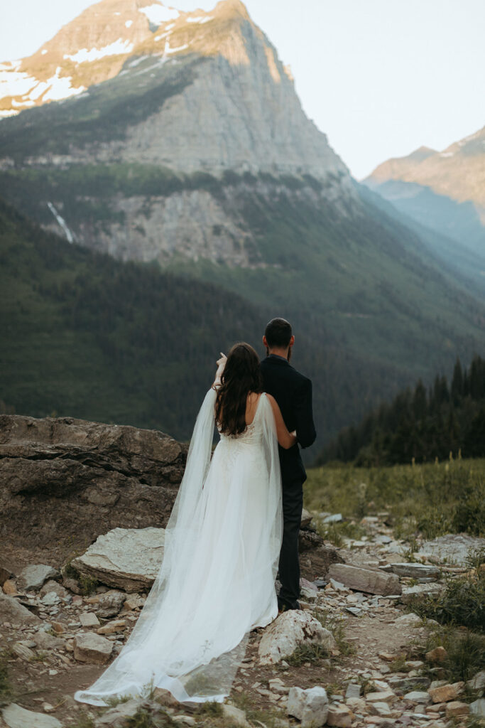 bride surprised groom during Glacier National Park elopement first look