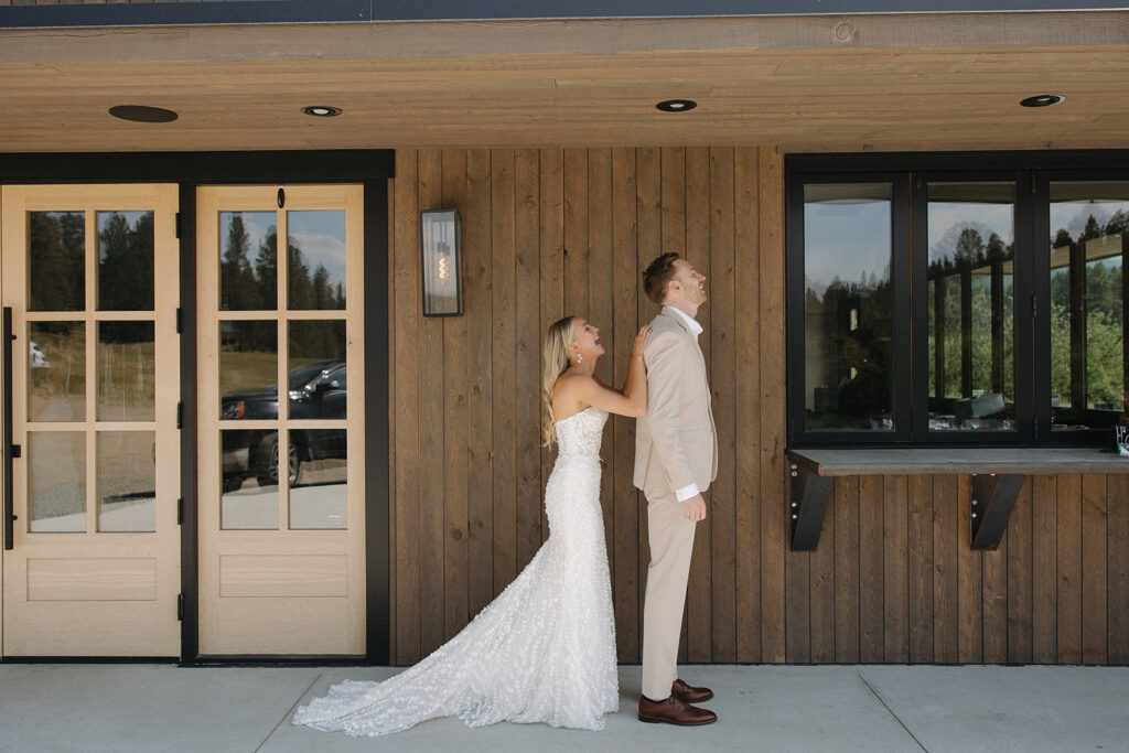 first touch with bride and groom at montana wedding venue