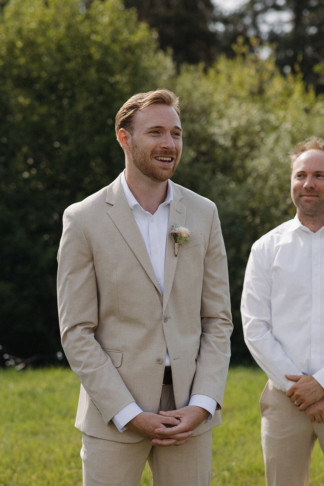 groom seeing bride walking down the aisle