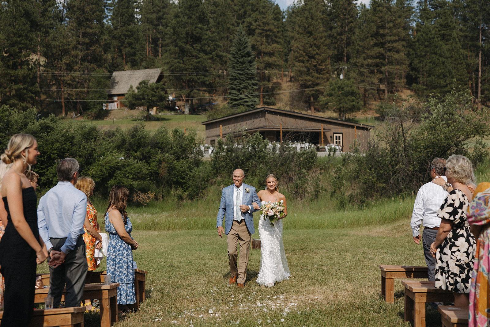 bride walking down the aisle at montana wedding venue