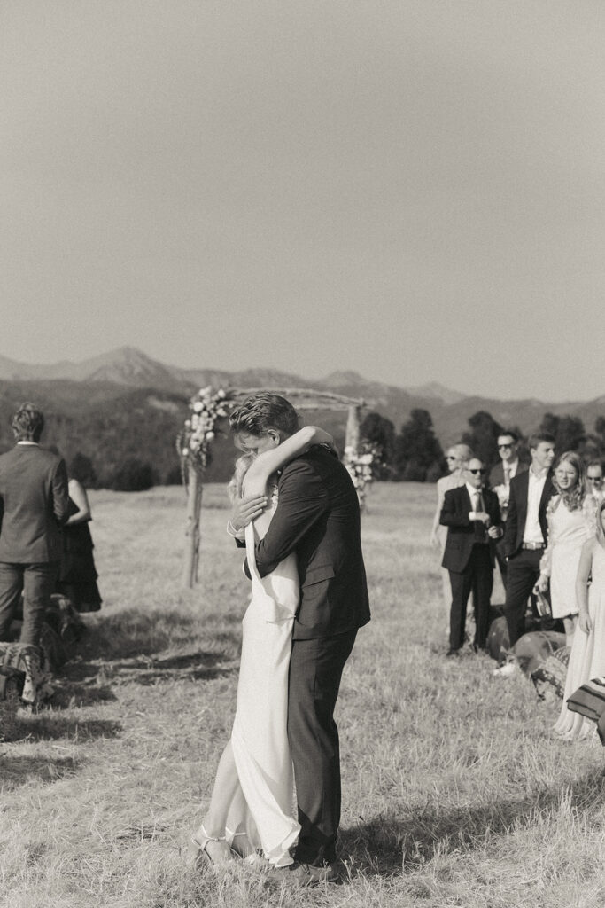 bride and groom kiss at montana intimate wedding