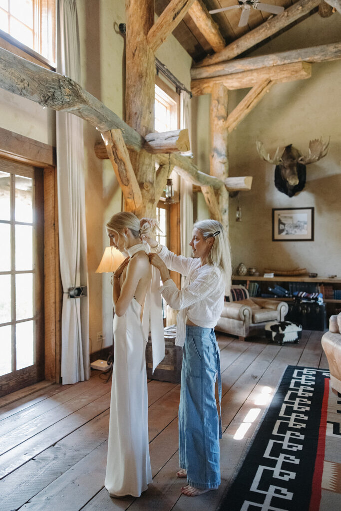 bride getting ready in montana lodge