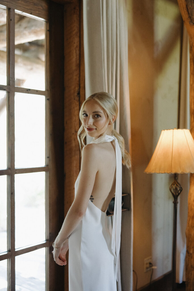 bride getting ready in montana lodge