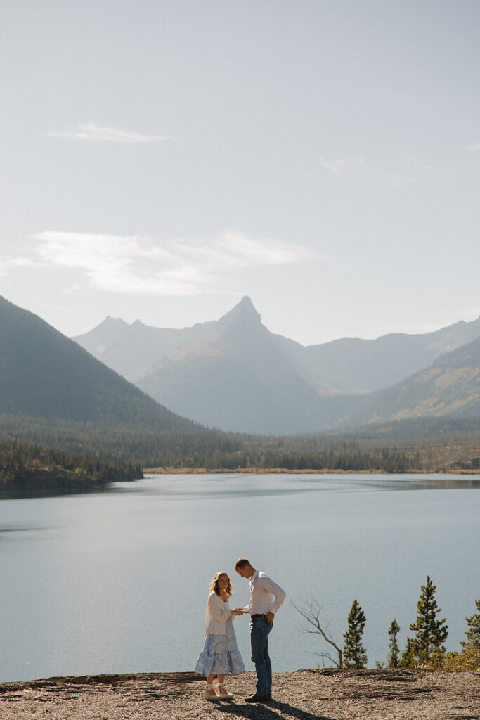 Couple standing at Sun Point in Glacier National Park