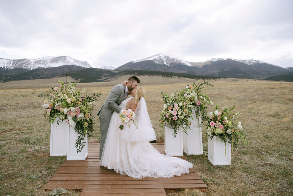 Three Peaks Ranch Colorado wedding ceremony with mountain views